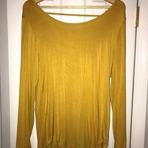 Crisscrossed back gold long sleeve tunic top:)